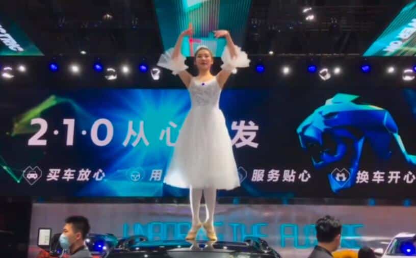 While Tesla owner protests atop a car, another carmaker shows ballet in similar setting