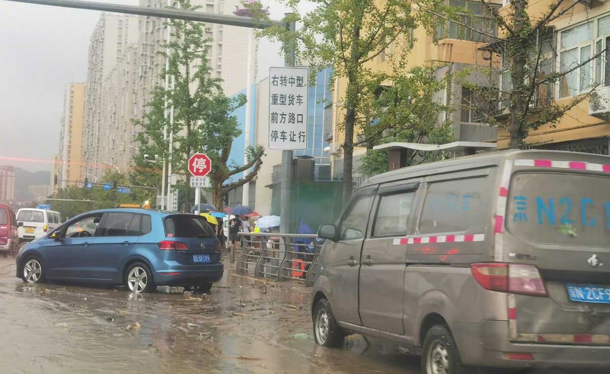 Beijing hit by rare rainstorms and floods