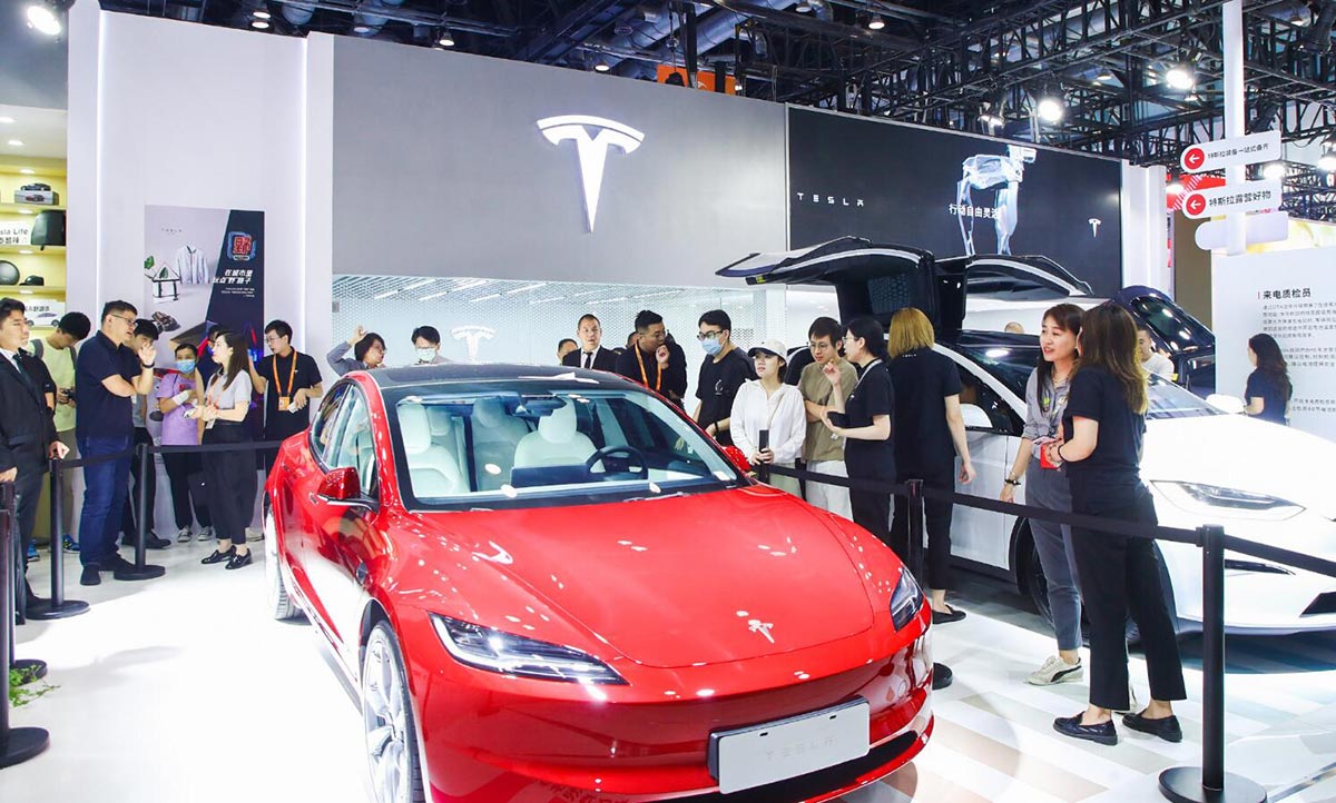 Tesla's revamped Model 3 makes real-life China debut at Beijing trade fair