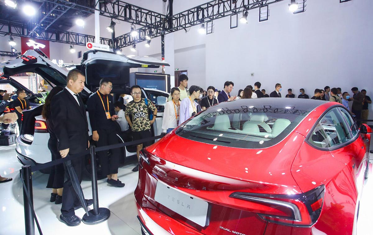 Tesla's revamped Model 3 makes real-life China debut at Beijing trade fair