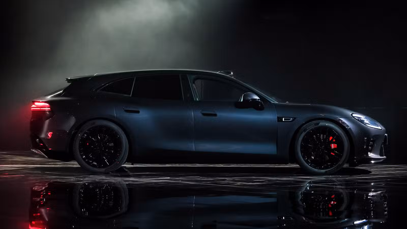 A side view of a black Aistaland GT7.